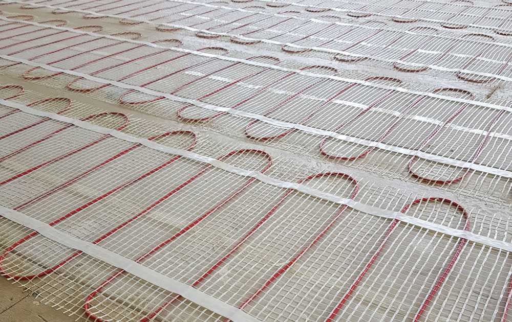 floor heating types under tile mat